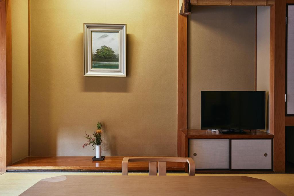 TV a/nebo společenská místnost v ubytování TSUCHIYA Kinosaki onsen