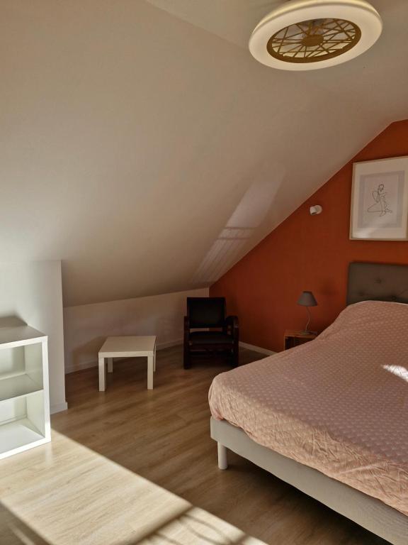 Postel nebo postele na pokoji v ubytování cocon d'Eden