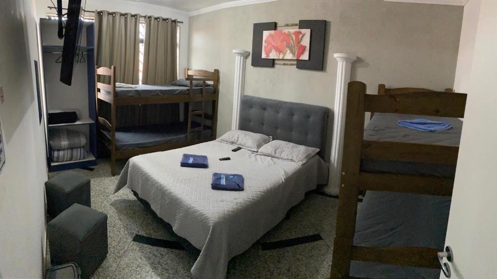 Кровать или кровати в номере Hostel Anprado #