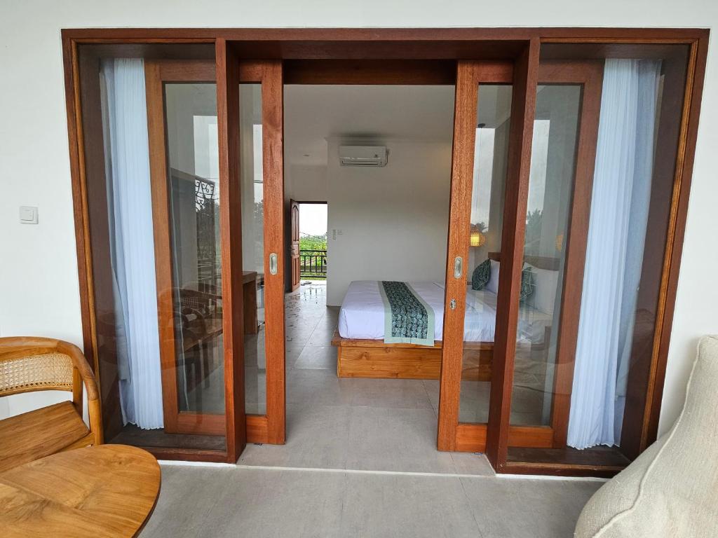 Postel nebo postele na pokoji v ubytování ANYA Guest House