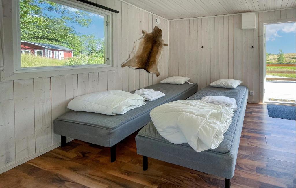 Postel nebo postele na pokoji v ubytování Cozy Home In Laholm With Wifi