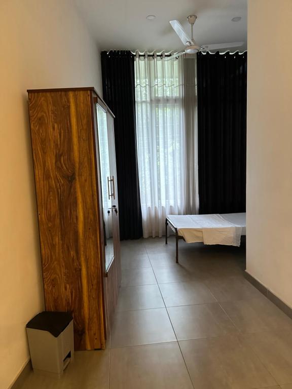 Postel nebo postele na pokoji v ubytování Varsity Villa