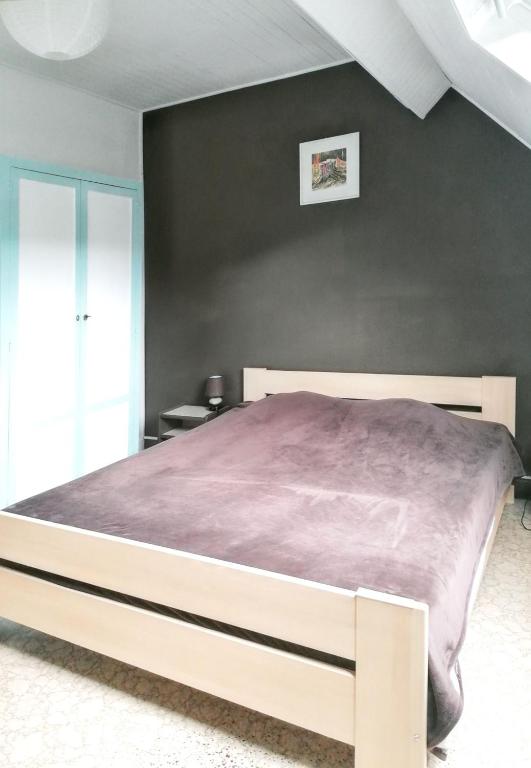 Posteľ alebo postele v izbe v ubytovaní Appartement familial à La Bourboule - 55 m² avec TV dans la chambre