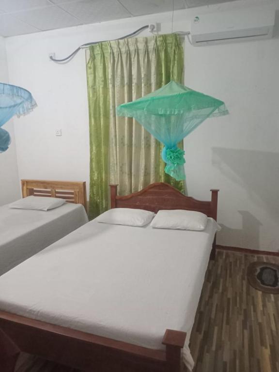 Postel nebo postele na pokoji v ubytování Green Villa