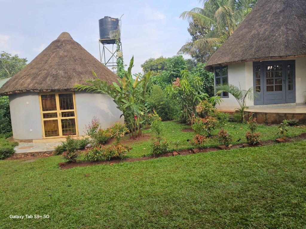Zahrada ubytování BN Private Beach & Resort - Jinja