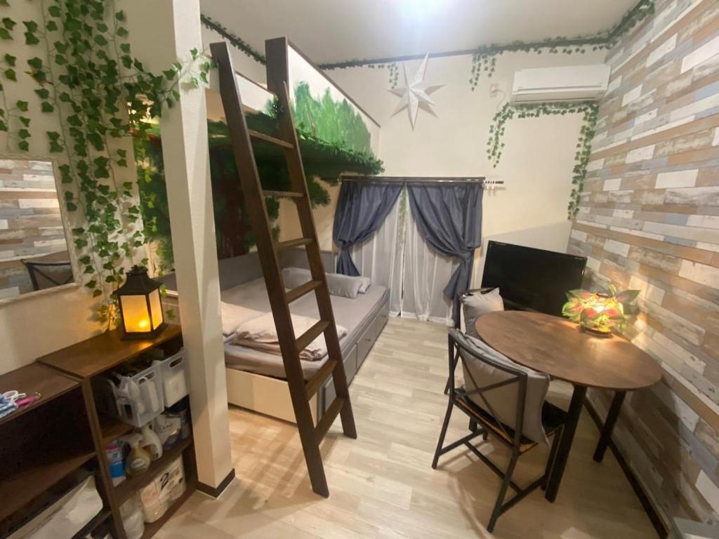 Katil atau katil-katil dalam bilik di Private & Cozy Studio Okegawa