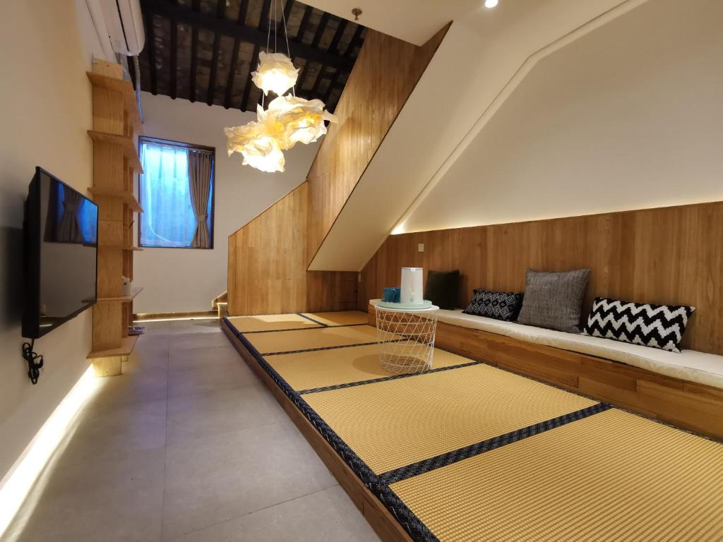 TV a/nebo společenská místnost v ubytování Suzhou Xugusu B&B-Tangyinci Taohuawu Branch