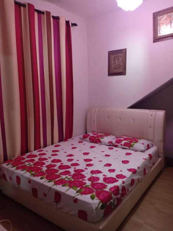 Postel nebo postele na pokoji v ubytování Homestay tanjung minyak perdana