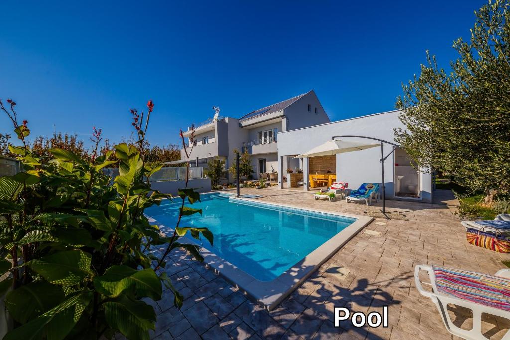 Bazén v ubytování Ferienhaus Elias Nikola nebo v jeho okolí