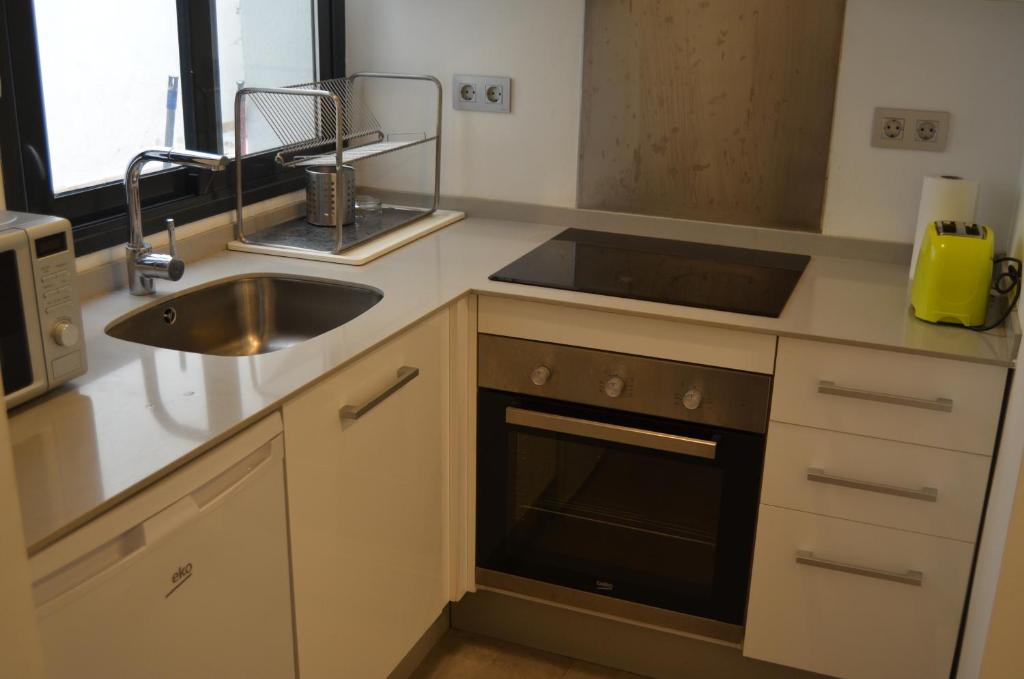 Kuchyňa alebo kuchynka v ubytovaní Lofts Miriam