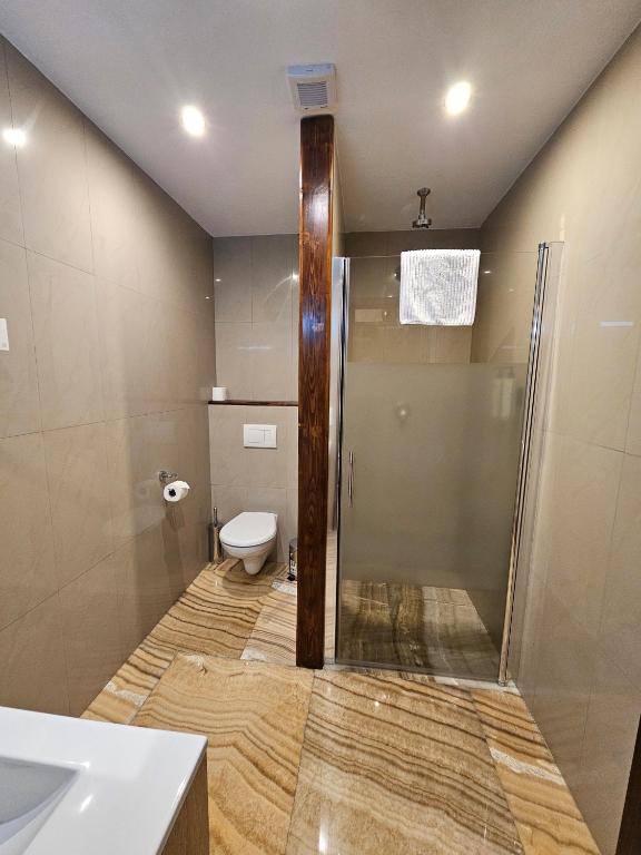 Koupelna v ubytování Hotel Galerie