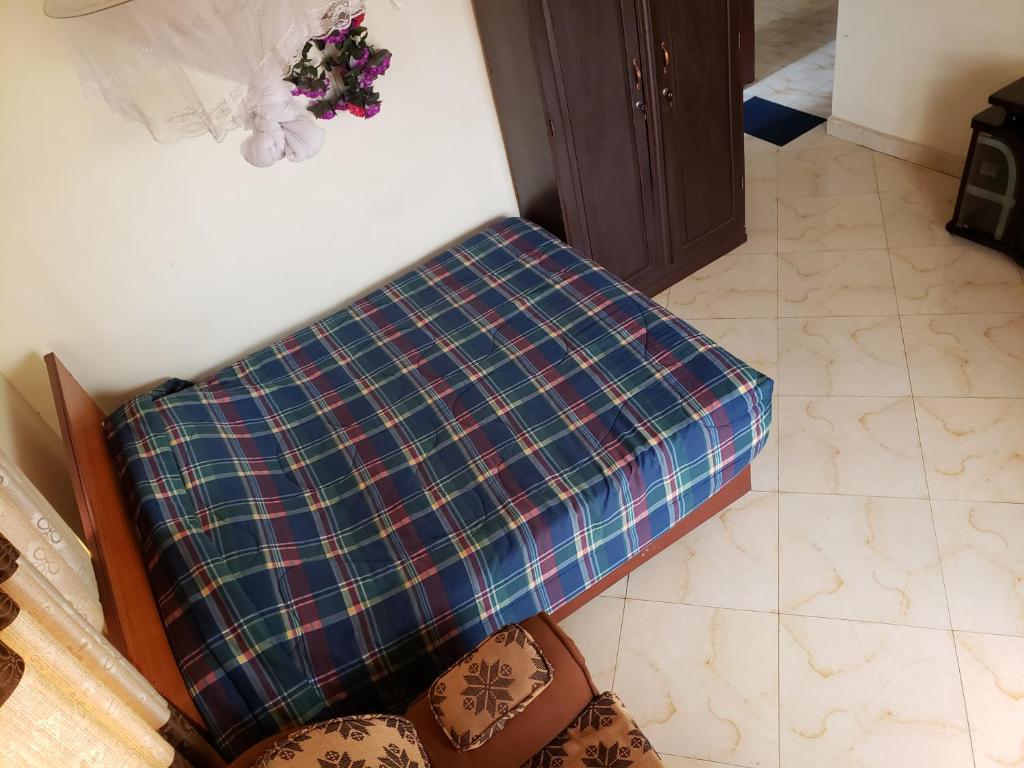 Ένα ή περισσότερα κρεβάτια σε δωμάτιο στο Kaliro Heights