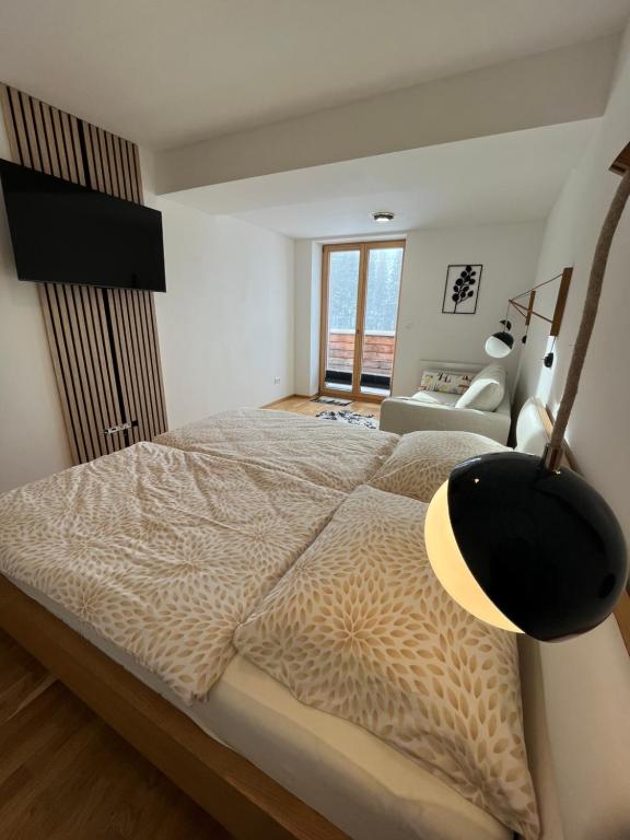 Postel nebo postele na pokoji v ubytování Slunečný apartmán