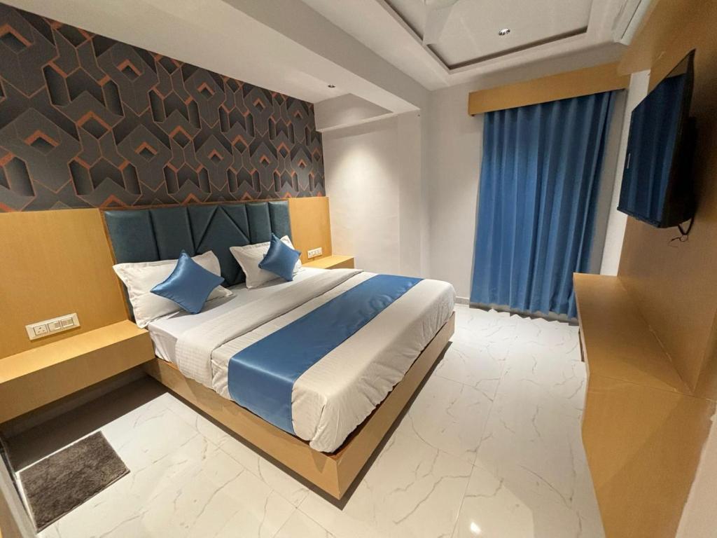 Postel nebo postele na pokoji v ubytování Hotel phoniex