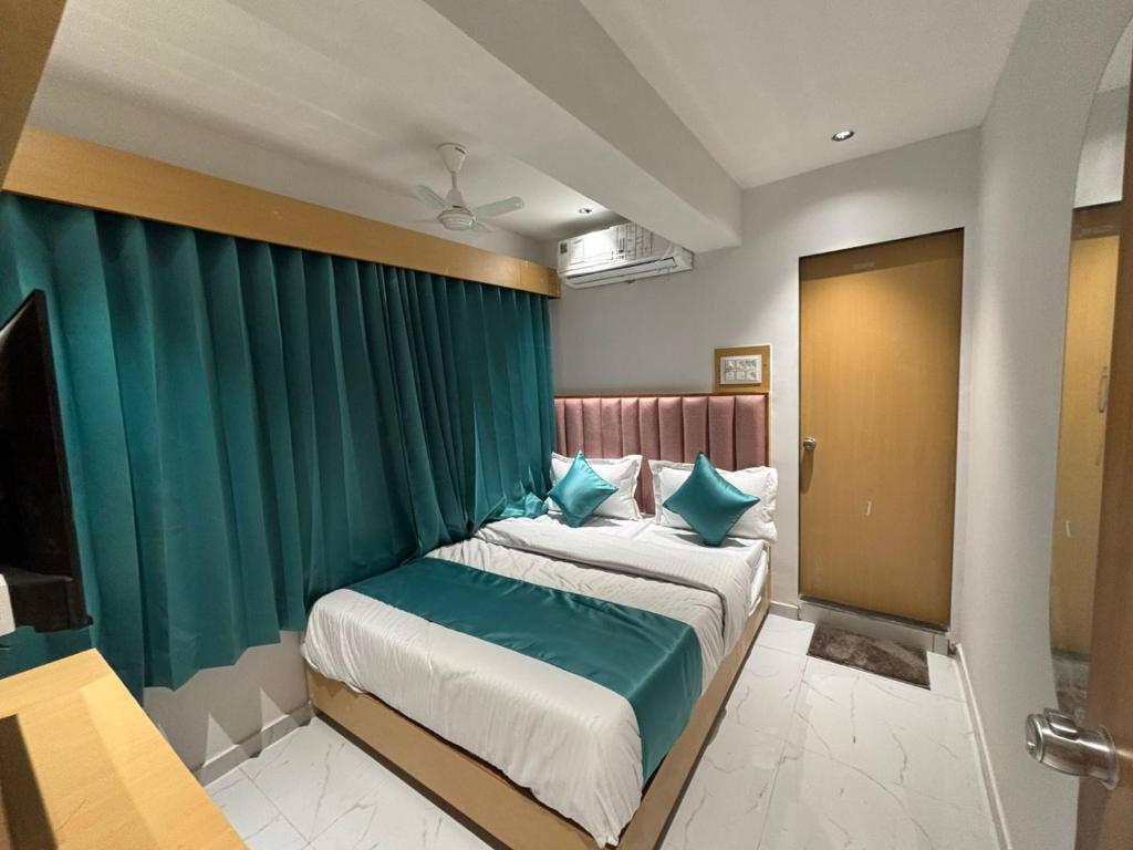 Postel nebo postele na pokoji v ubytování Hotel phoniex