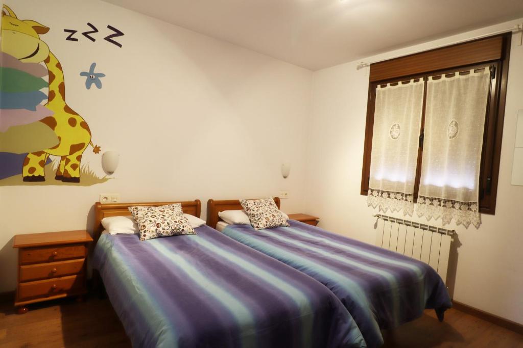 Postel nebo postele na pokoji v ubytování Al Rincon de Emi