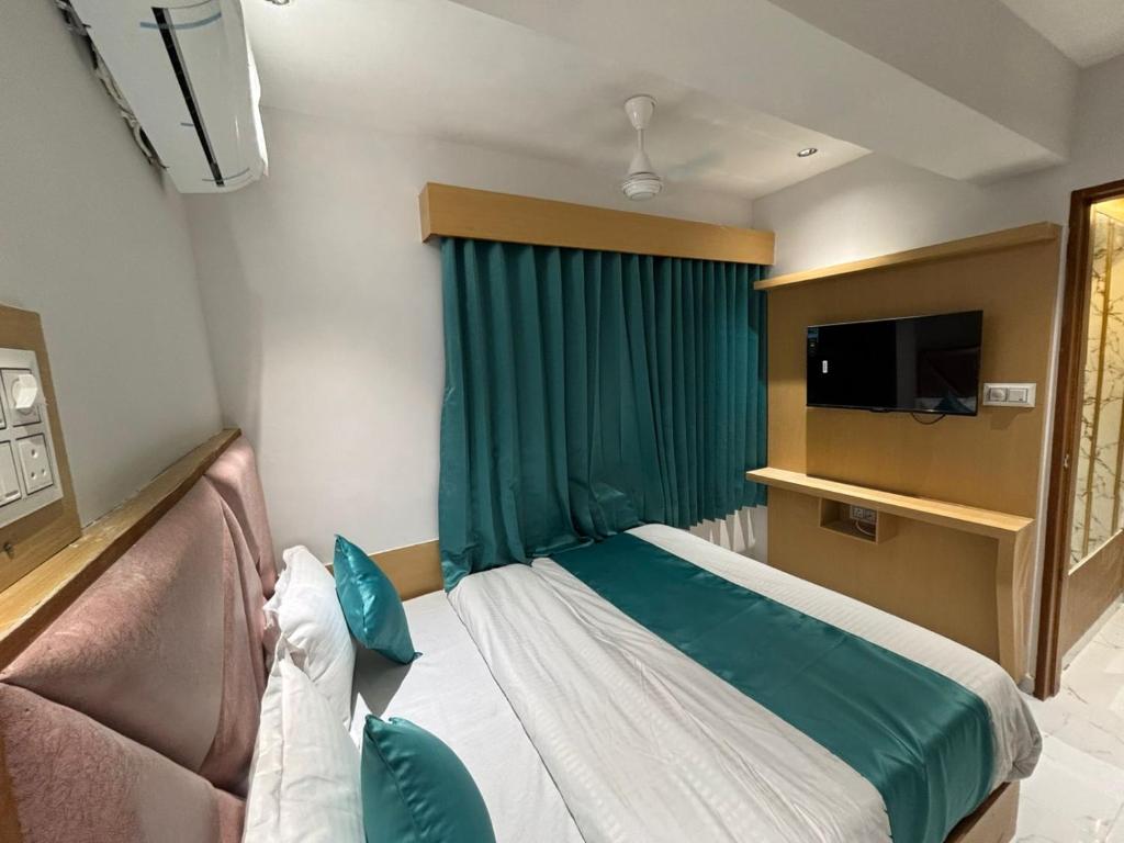 Postel nebo postele na pokoji v ubytování Hotel phoniex
