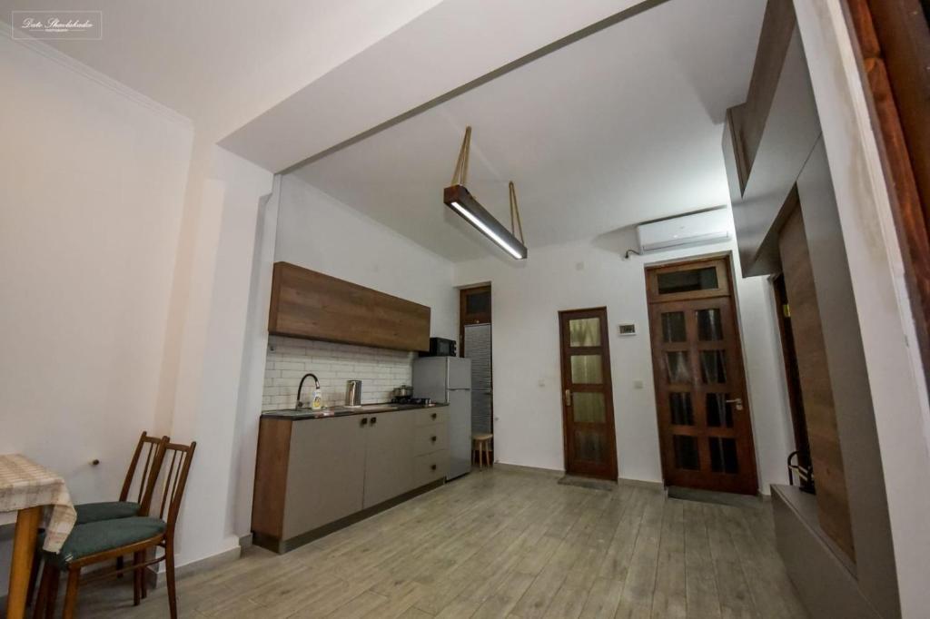 Kuchyň nebo kuchyňský kout v ubytování Apartment Soho Tabidze