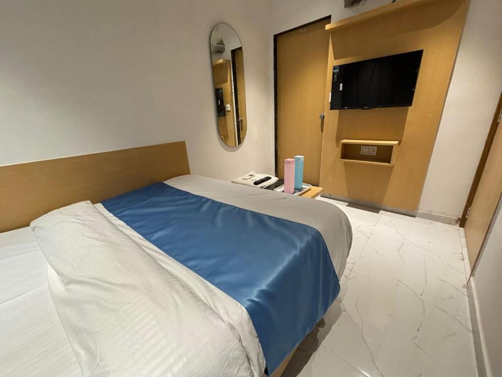 Postel nebo postele na pokoji v ubytování Hotel phoniex