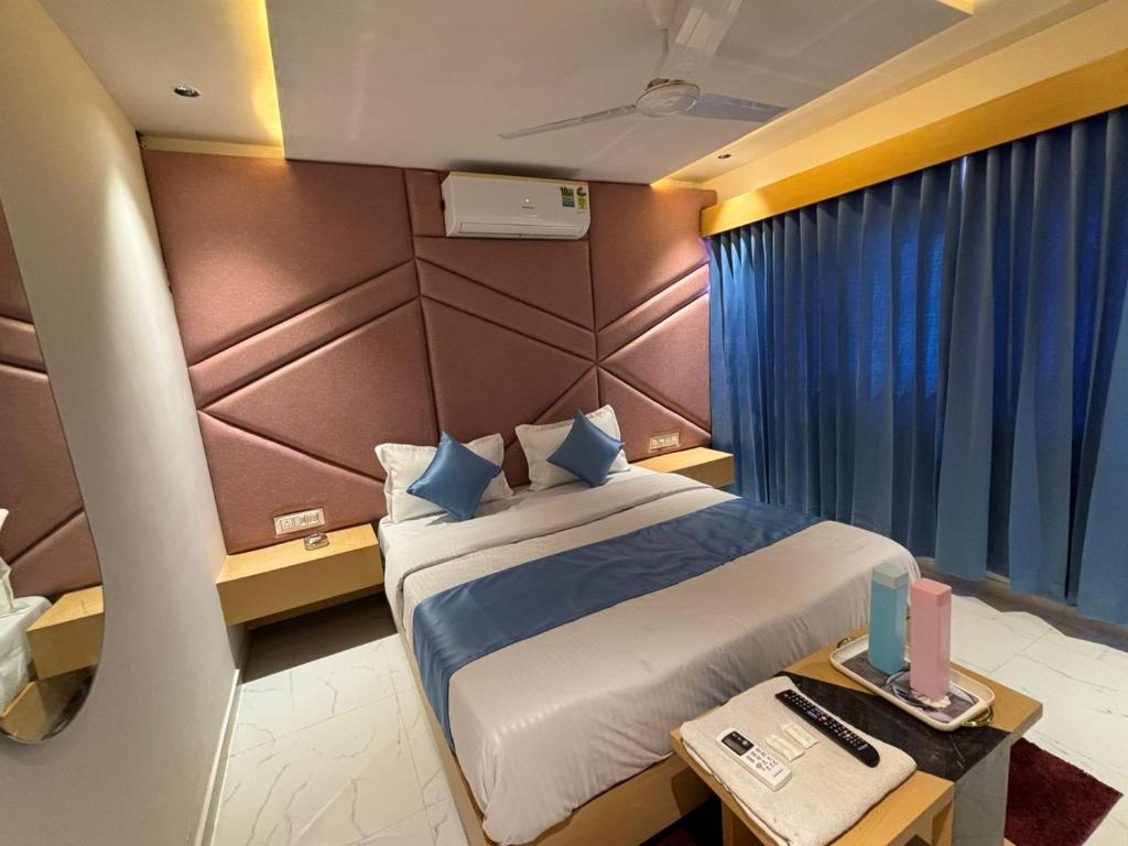 Postel nebo postele na pokoji v ubytování Hotel phoniex