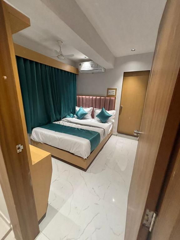 Postel nebo postele na pokoji v ubytování Hotel phoniex