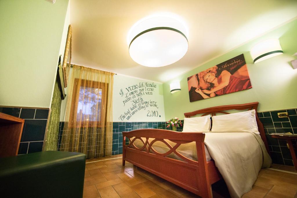 Postel nebo postele na pokoji v ubytování B&B 7 Vizi