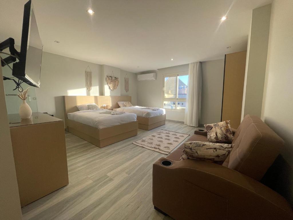 Postel nebo postele na pokoji v ubytování Diyar Pyramids Inn