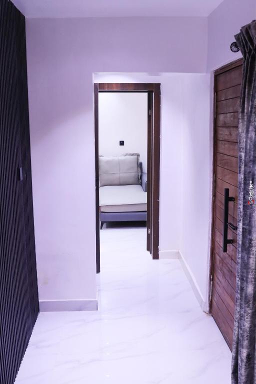 Postel nebo postele na pokoji v ubytování Meenah luxury homes