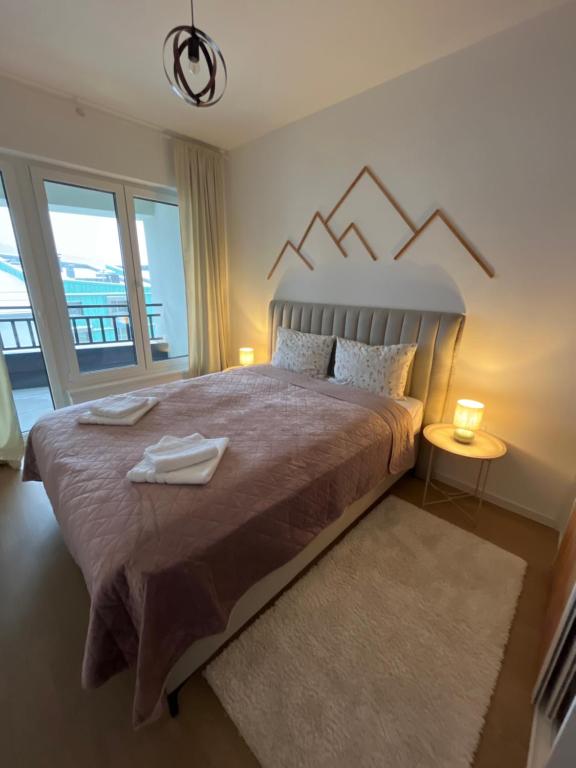 Ένα ή περισσότερα κρεβάτια σε δωμάτιο στο Mountain Dream Bjelašnica