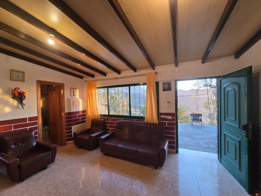 Posezení v ubytování Rustic House Seavienws & Minibar