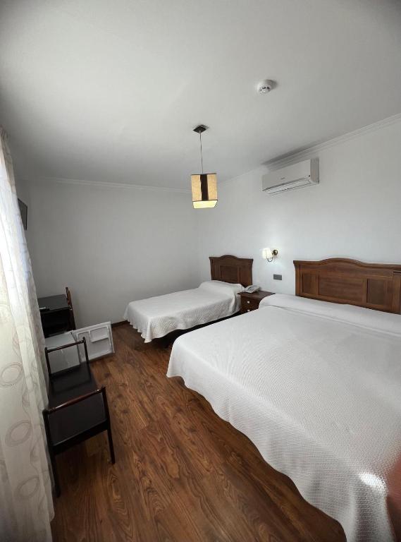 Posteľ alebo postele v izbe v ubytovaní Hotel Restaurante Dama de Baza