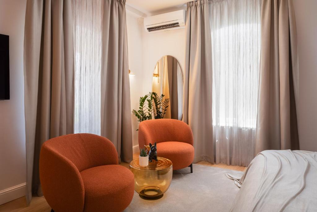 Posezení v ubytování Golden Gate Deluxe Room - Unique UNESCO Location