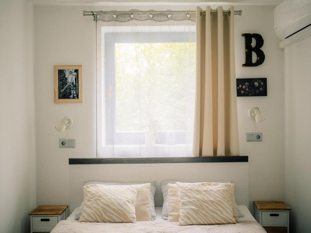 Letto o letti in una camera di Kékbazalt Vendégház