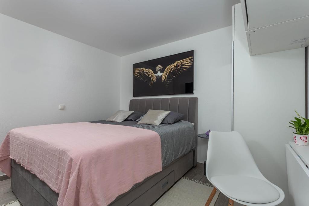 Posteľ alebo postele v izbe v ubytovaní Apartment Queen Hvar