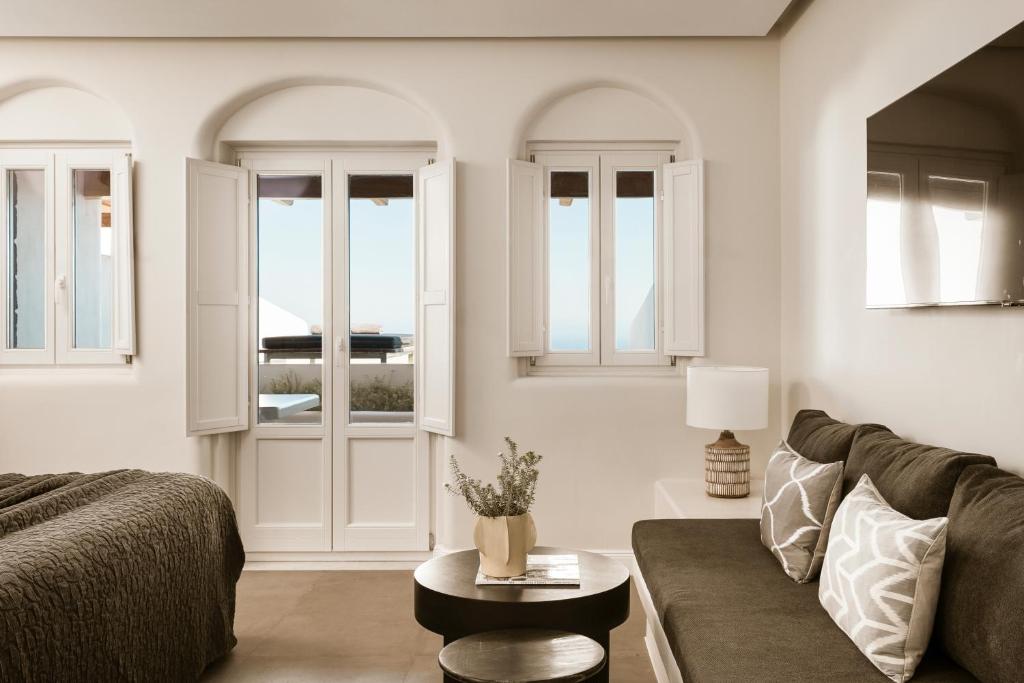 Posezení v ubytování NĒRO Suites by NOMÉE Hospitality Group