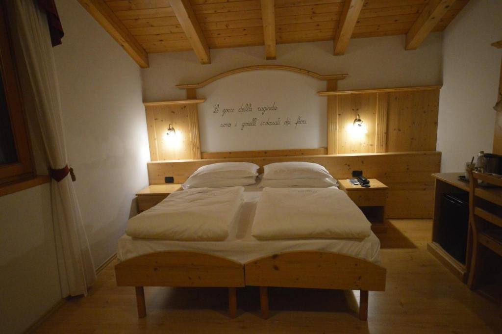 Postel nebo postele na pokoji v ubytování Hotel Garnì Sant'Antonio con Spa