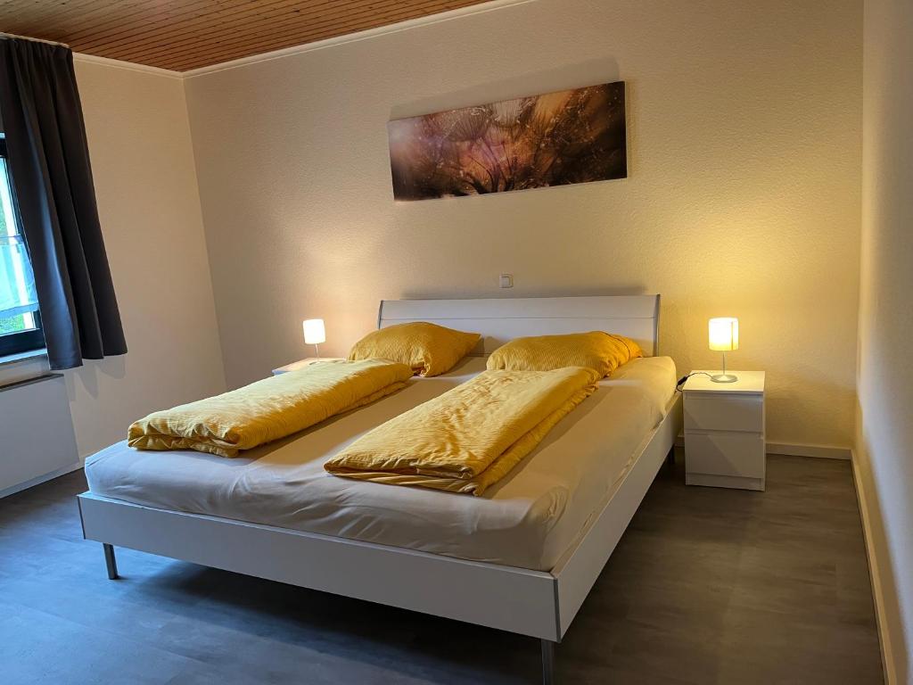 Postel nebo postele na pokoji v ubytování Eifelhaus4you