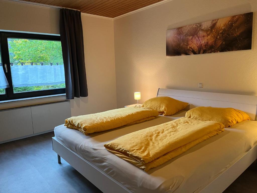 Postel nebo postele na pokoji v ubytování Eifelhaus4you
