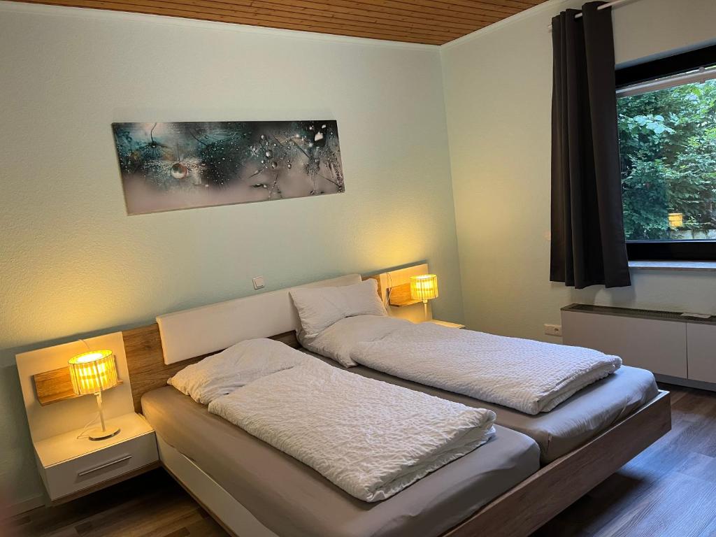 Postel nebo postele na pokoji v ubytování Eifelhaus4you