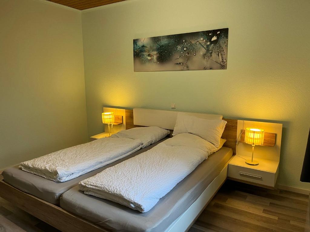 Postel nebo postele na pokoji v ubytování Eifelhaus4you