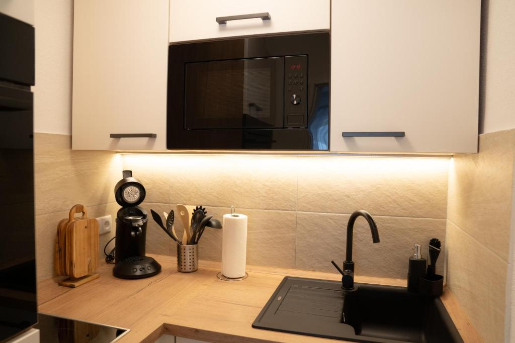 Kuchyň nebo kuchyňský kout v ubytování Ferienwohnung Clara