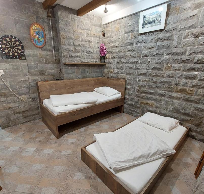 Postel nebo postele na pokoji v ubytování APARTMA NIKA