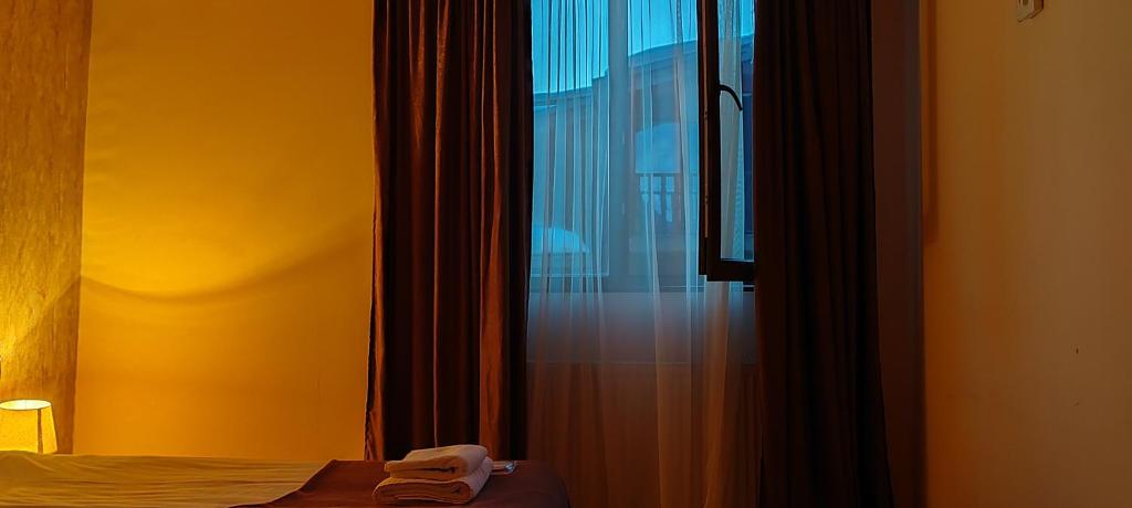 Postel nebo postele na pokoji v ubytování Hotel Svanseti