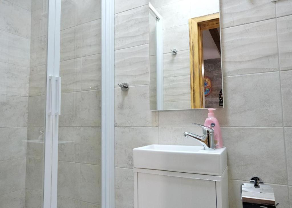 Koupelna v ubytování APARTMA NIKA