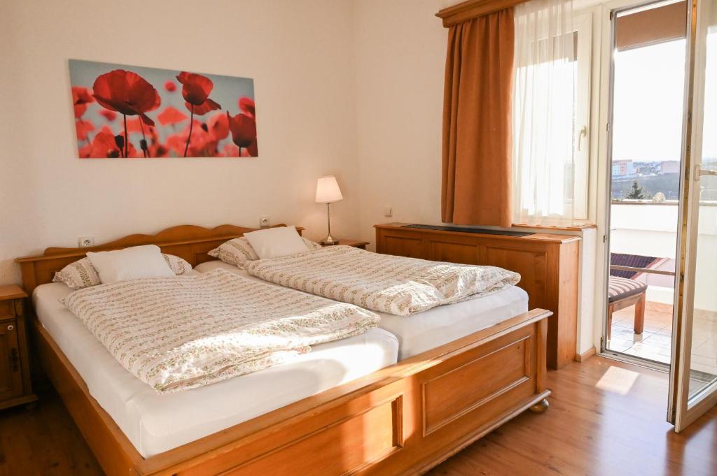 Postel nebo postele na pokoji v ubytování HOTEL DIANA apartments