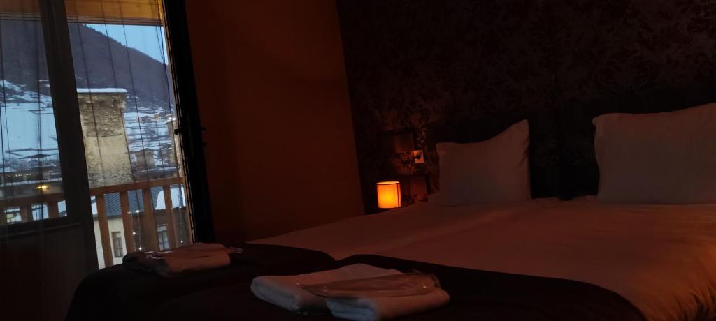Postel nebo postele na pokoji v ubytování Hotel Svanseti
