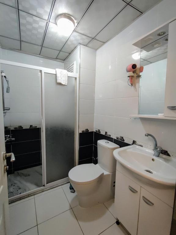 Koupelna v ubytování ADOR TROIA HOTEL