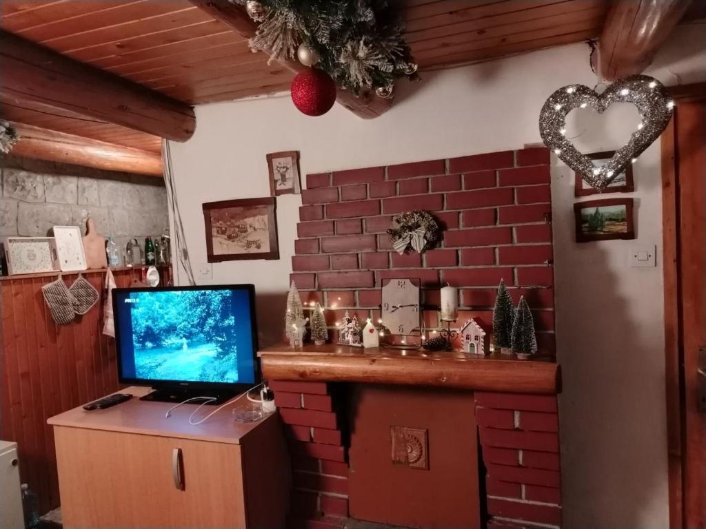 TV a/nebo společenská místnost v ubytování Vila Lara