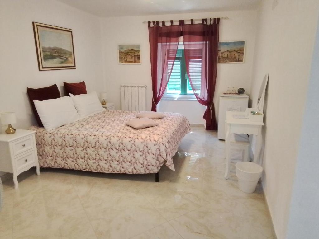 Postel nebo postele na pokoji v ubytování ANITA B&B