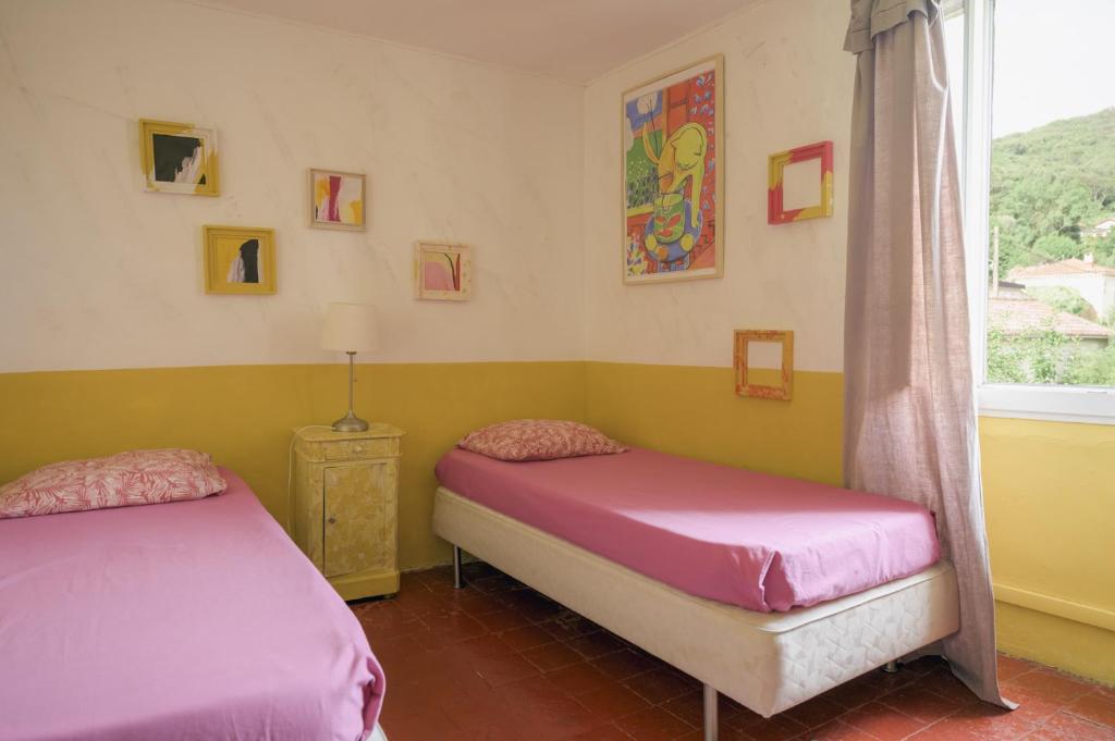 Postel nebo postele na pokoji v ubytování Gites de la Soulondre